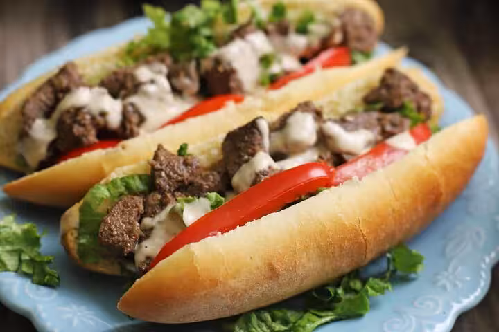 Explore Cairo's culinary scene with a traditional beef and vegetable sandwich on the authentic food tour.