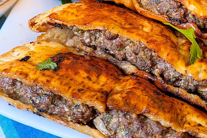 Savor the taste of Cairo with freshly baked stuffed pastries on the Authentic Cairo Food Tour in downtown.