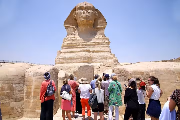 Tour group at the Great Sphinx of Giza on a Cairo highlights tour with pyramids and Egyptian Museum visit
