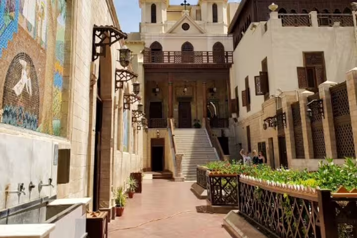 Historic courtyard in Old Cairo Islamic district, cultural walk near Four Seasons Hotel luxury travel package