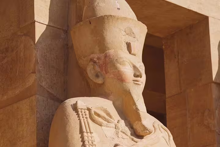Ancient pharaoh statue at Luxor temple, featured on the 5 days 4 nights Cairo to Luxor Egypt tour package
