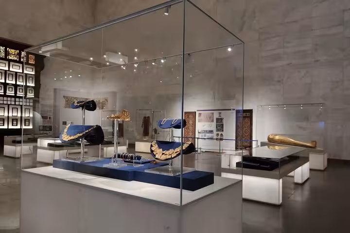 Glass display of ancient Egyptian jewelry at Cairo National Museum of Egypt, QR ticket experience