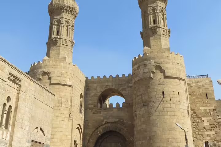 Citadel of Saladin towers in Cairo, scenic highlight on night tour including El Fishawy Cafe and Azhar Park dinner