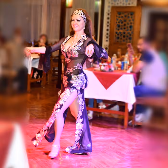 Belly dancer show during an evening Cairo Nile dinner cruise, with private transfer and onboard dining