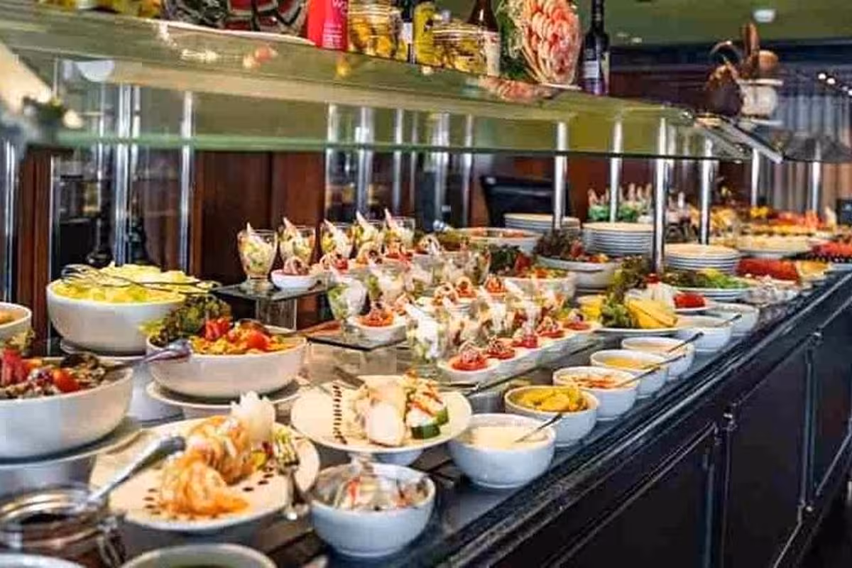 All-you-can-eat buffet on Cairo Nile dinner cruise, featuring Egyptian appetizers and desserts with transfers