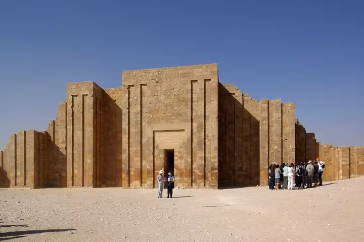 Tour group at Saqqara Step Pyramid complex entrance on Cairo private tour to Giza, Memphis and Saqqara with lunch