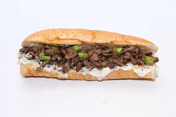 Explore Egyptian street food with a flavorful beef liver sandwich on the Cairo culinary tour.