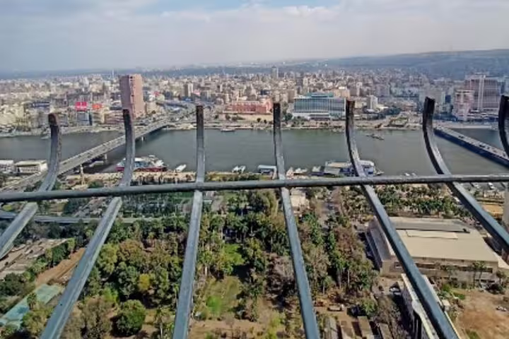 Panoramic Cairo skyline and Nile River view from Cairo Tower observation deck, part of El-Moez Street tour