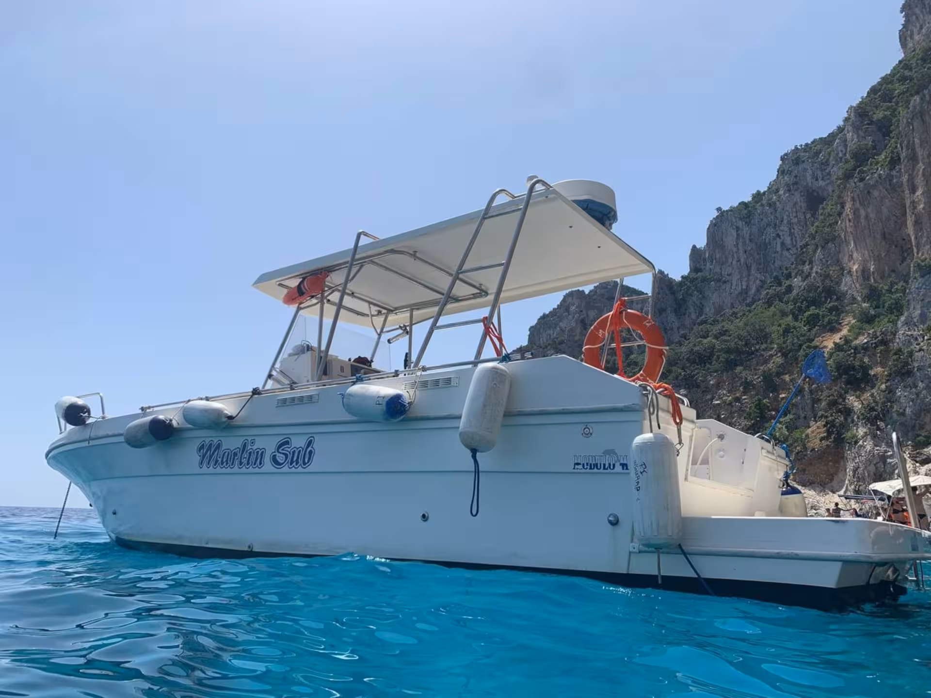 Explore the Gulf of Orosei on a boat trip from Cala Gonone, featuring crystal-clear waters and rugged cliffs.