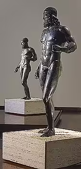 Ancient bronze statues displayed in a Calabrian museum, cultural highlight of The Intense Flavor of Calabria self drive tour