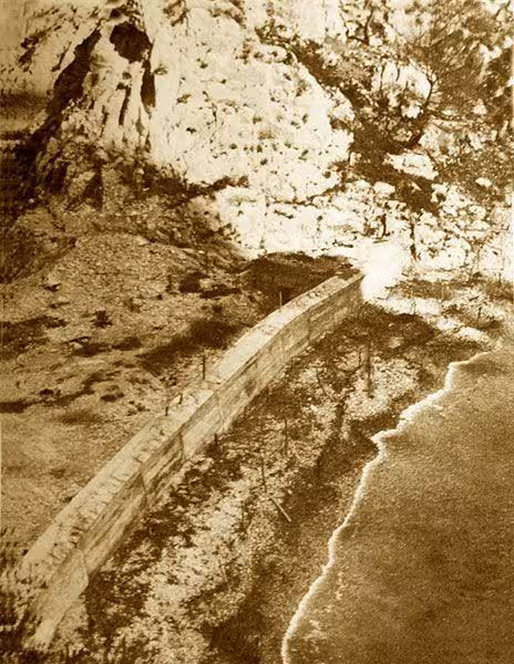 Coastal path below limestone cliffs in Calanques National Park on the En-Vau Port-Pin Port-Miou hike