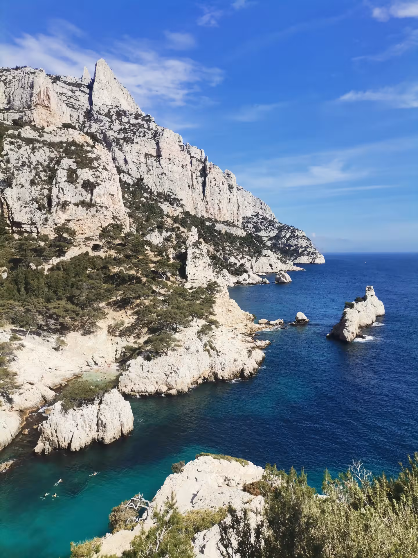 Calanques de Provence limestone cliffs above turquoise Mediterranean coves on a 14-day guided hiking getaway