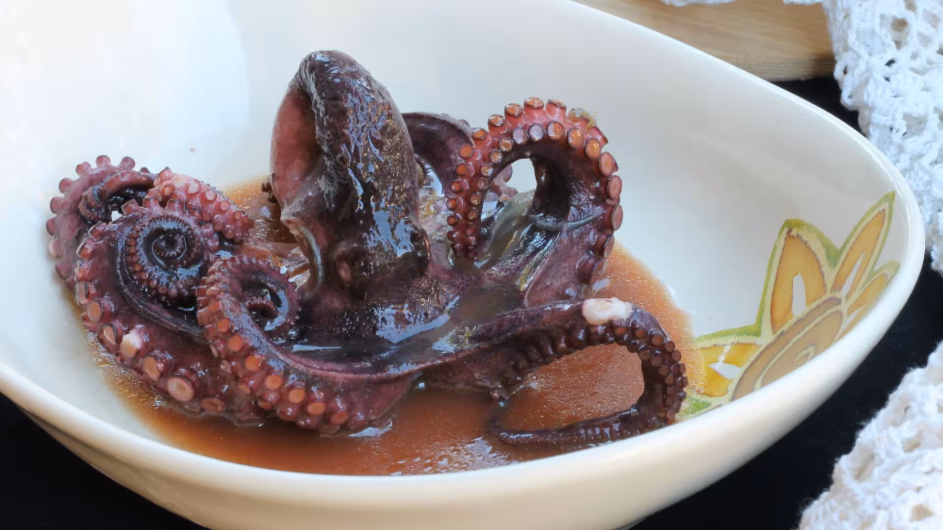 Freshly prepared octopus dish from local catch on a Calasetta fishing boat tour to San Pietro Island.