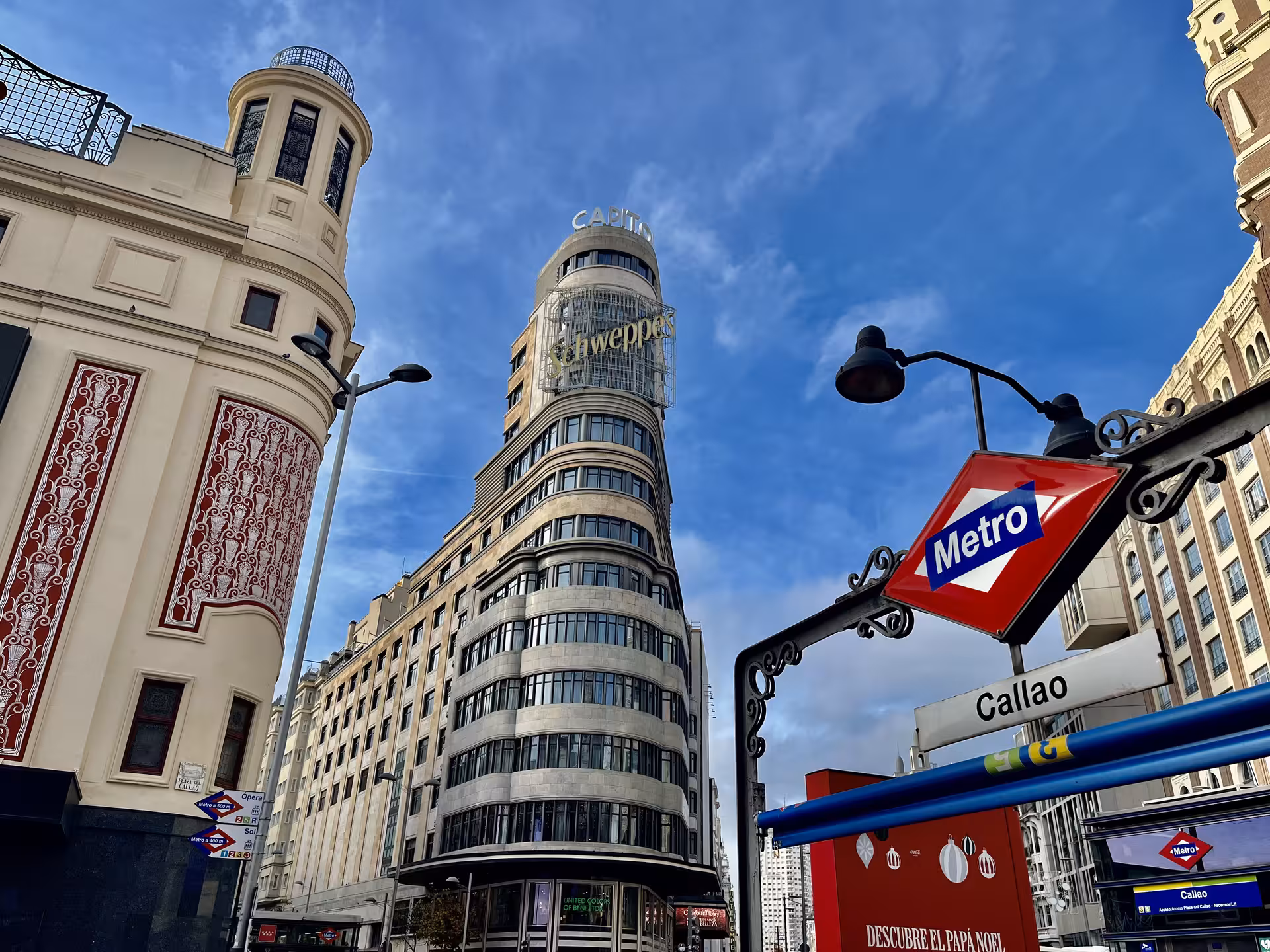 Callao Square Madrid with Capitol Building and Schweppes sign, iconic stop on Madrid local secrets city tour