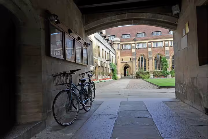 Cambridge college courtyard passage with bicycles, a stop on a self-guided scavenger hunt and highlights tour