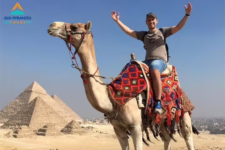 Camel ride at Giza Pyramids in Cairo, Egypt, perfect for a 5-day Cairo short break tour package