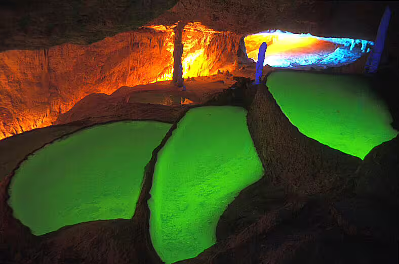 Glowing underground pools and cave chambers on Can Marçá Cave guided tour with entry, Puerto de San Miguel