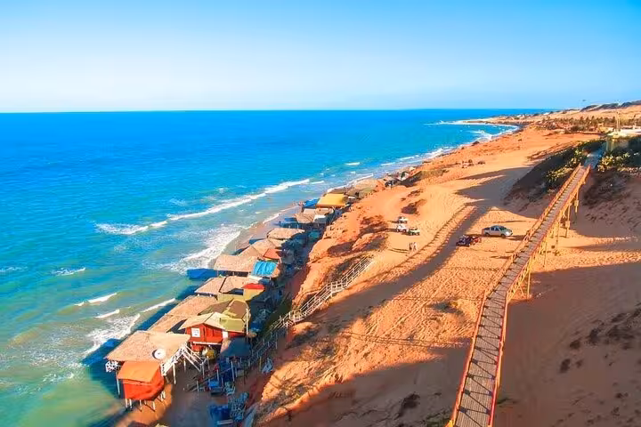 Aerial view of Canoa Quebrada beach dunes and sea huts, highlight on 3 beaches in 1 day tour Ceará