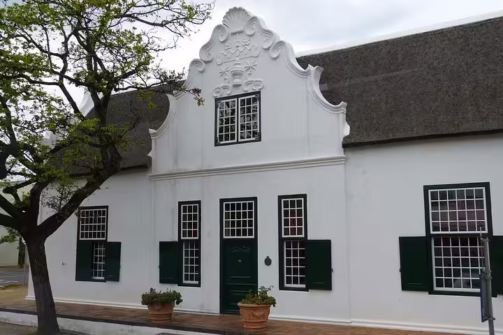 Historic Cape Dutch architecture in Stellenbosch, a highlight of the Cape Winelands day tour from Cape Town.