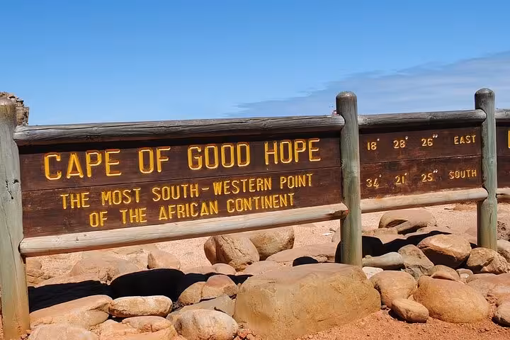 Sign at Cape of Good Hope marking the most south-western point of Africa, a key stop on Cape Town's scenic tours.