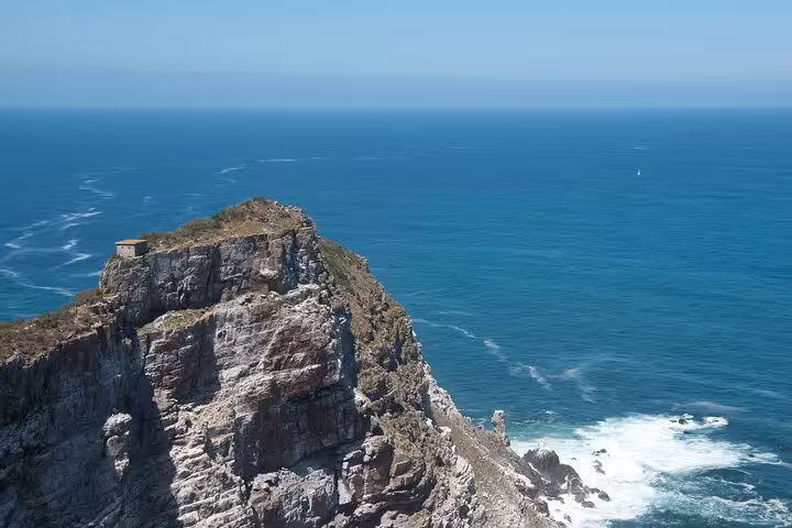 Dramatic Cape Point cliffs overlooking the Atlantic Ocean on a Cape Peninsula full-day tour from Cape Town