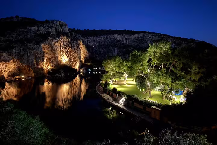 Night view of Lake Vouliagmeni on the Athens Riviera, scenic stop on Cape Sounio private tour to Poseidon