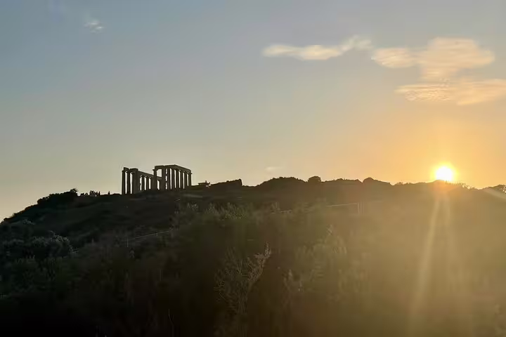 Sunset view of Cape Sounio with Temple of Poseidon silhouette, iconic finale of an Athens Riviera private tour