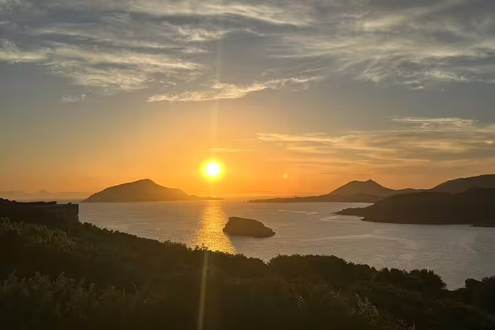 Golden sunset over the Aegean Sea from Cape Sounio viewpoint on a Temple of Poseidon private tour