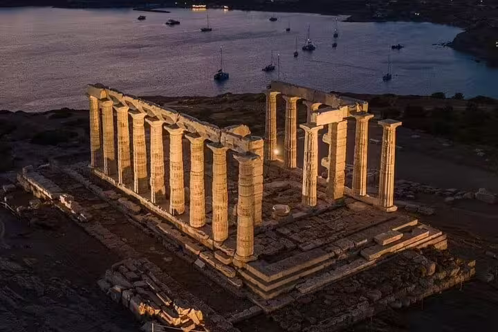Aerial twilight view of Cape Sounio Temple of Poseidon on a private Athens day tour with Saronic Gulf backdrop