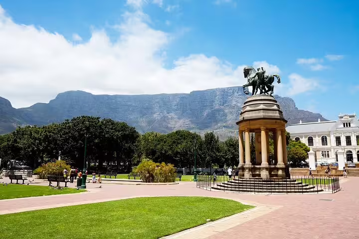 Cape Town City Hall gardens with statue and Table Mountain backdrop on full-day Cape Town sightseeing tour