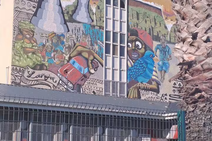 Vibrant street art in Langa showcasing local culture and history, a highlight of Cape Town's township tours.