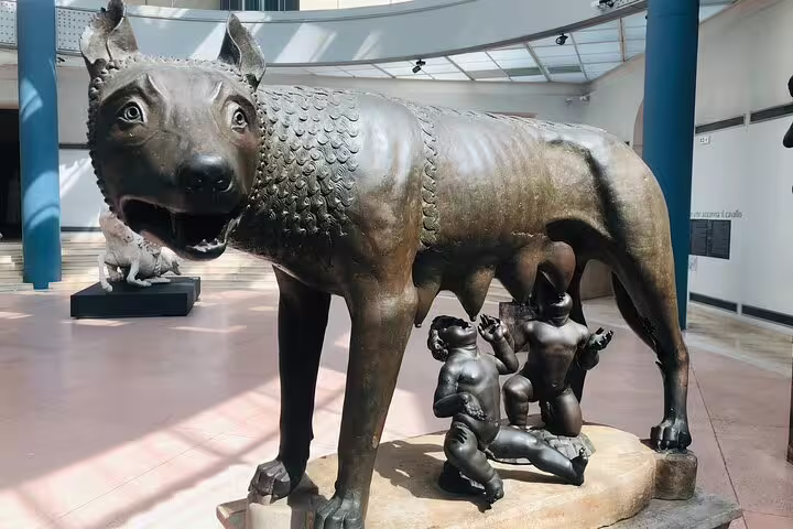 Bronze Capitoline Wolf with Romulus and Remus inside the Capitoline Museums in Rome, visited on a private guided tour
