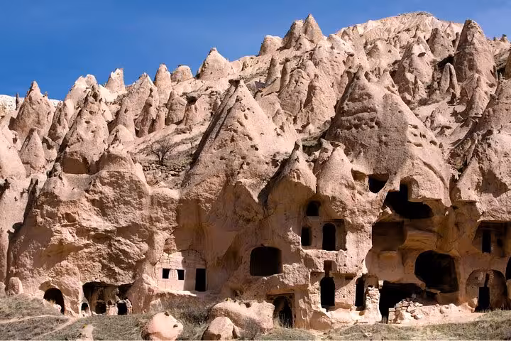 Cappadocia full-day small group tour view of cave dwellings and fairy chimneys carved in tuff rock