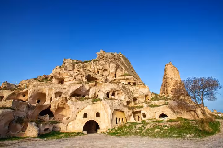 Cappadocia ancient cave dwellings carved into sandstone cliffs, a highlight on the 8-day Touch of Mediterranean tour