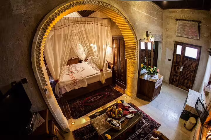 Traditional Cappadocia cave hotel room interior, included on 13-day private Turkey history tour with flights and 4-star comfort