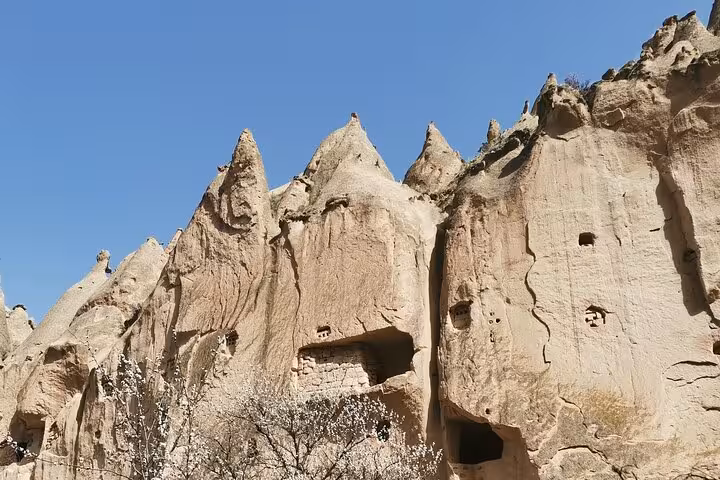 Cappadocia fairy chimney cliffs with cave dwellings on private tour from Istanbul by plane, Turkey