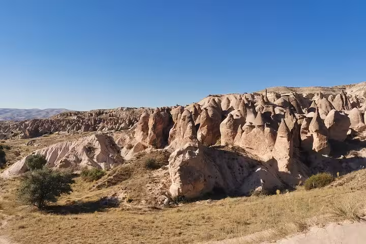 Panoramic Cappadocia fairy chimneys and rugged valleys on a 2-day private trekking tour with local guide
