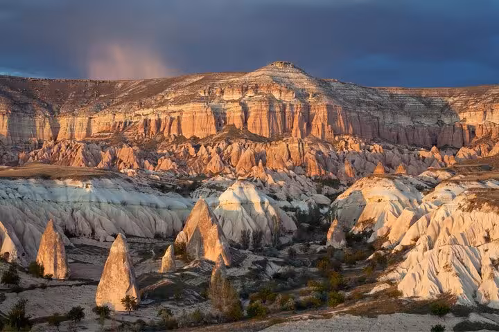 Panoramic Cappadocia fairy chimneys at sunset, scenic viewpoint stop on a private tour with lunch