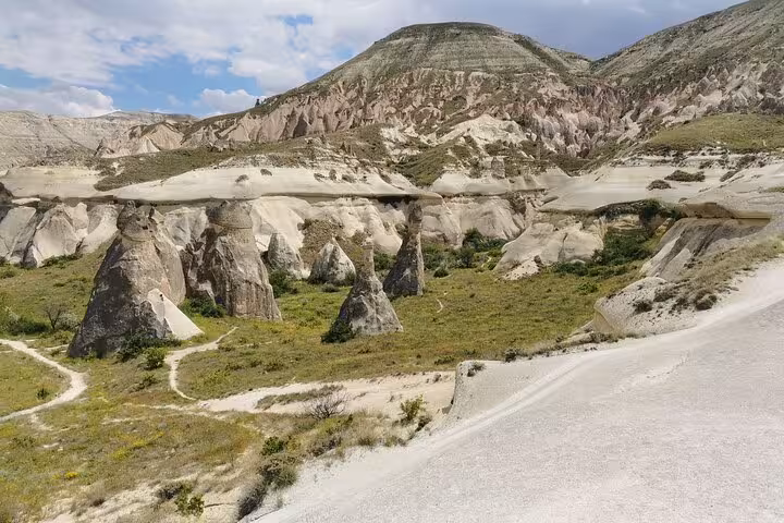 Cappadocia valley landscape with fairy chimneys and hiking trails, highlight of a 9-day private Turkey tour