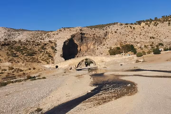 Scenic stone bridge and rocky canyon near Sanlıurfa, explored on private Göbeklitepe tour from Istanbul