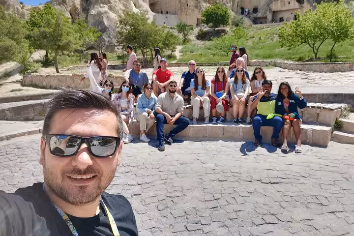 Group photo on private Cappadocia tour from Istanbul at Göreme rock formations, ideal add-on to Göbeklitepe