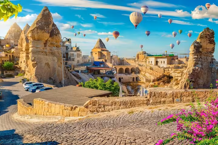 Cappadocia hot air balloon option over Göreme town and fairy chimneys on an all-inclusive 2-day private tour