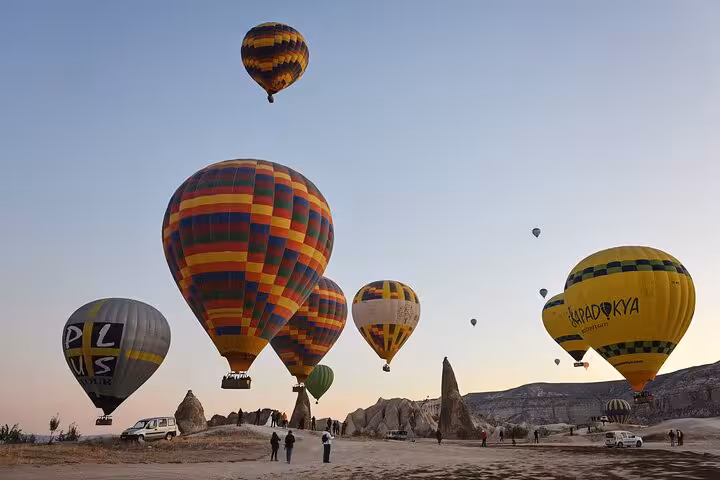 Cappadocia sunrise hot air balloon flight over fairy chimneys, highlight of 3-day private Turkey tour package