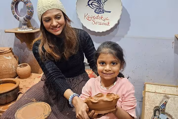 Family pottery workshop in Avanos, Cappadocia, on full-day small group North Tour with local ceramics