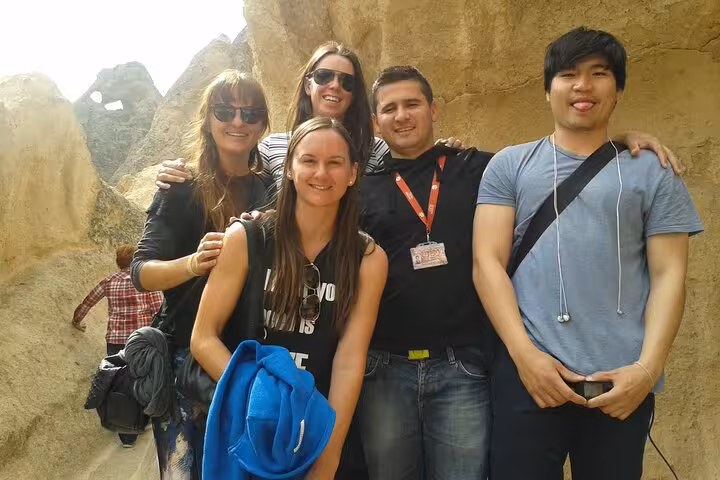 Group photo with local guide in Cappadocia rock valley on private tour from Istanbul by plane, Göreme