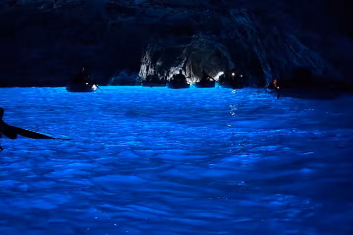 Explore the enchanting Blue Grotto with its glowing azure waters on a Capri shore excursion from Naples.