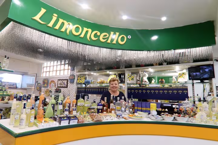 Vibrant Limoncello shop in Capri with a variety of local products displayed, highlighting Italian culture.