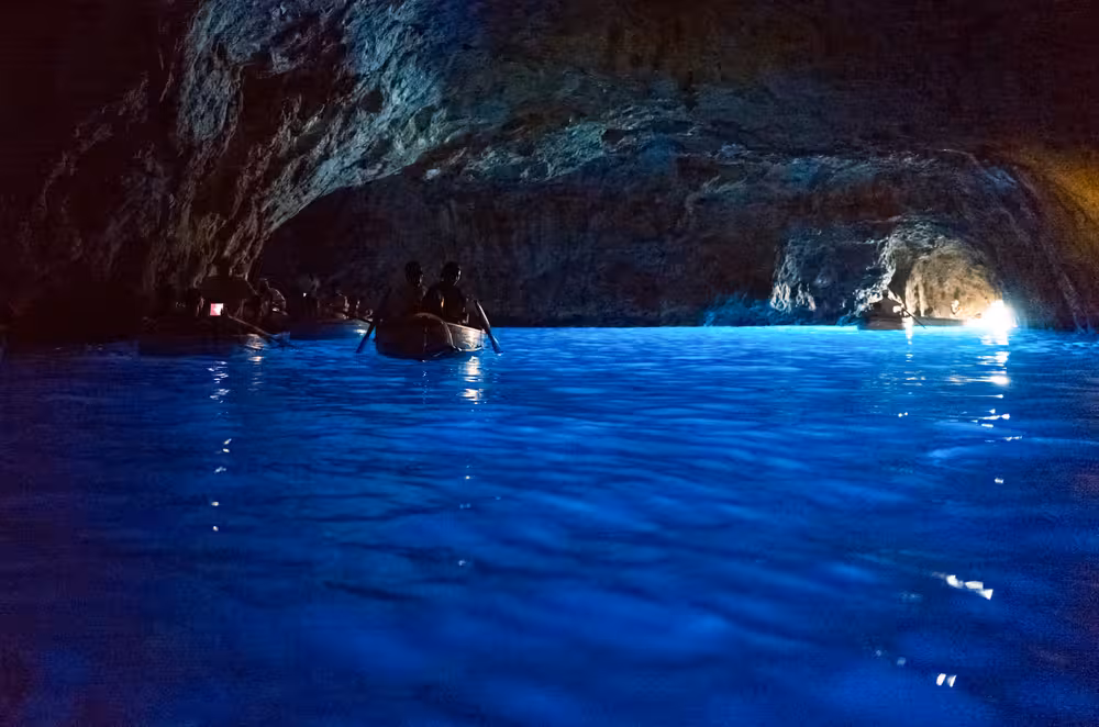 Experience the enchanting Blue Grotto on the Capri and Pompeii full day tour from Naples.