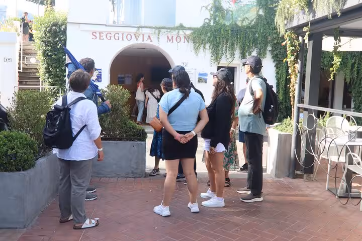 Visitors gather at the entrance of Seggiovia Monte Solaro, a popular spot on the Capri tour.