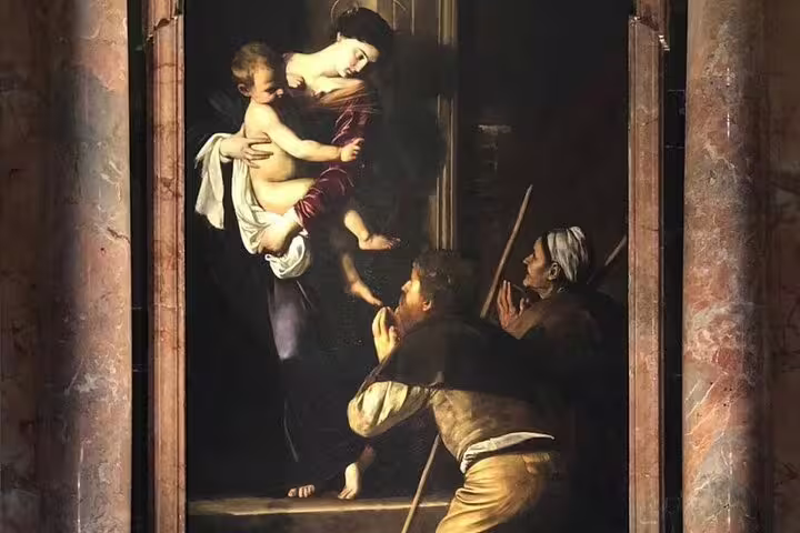 Close-up of a Caravaggio Madonna and Child Baroque painting admired during a Rome private Caravaggio masterpieces tour
